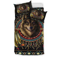 Front view of black duvet and shams featuring brown wolf face, dreamcatcher circle, and tassels