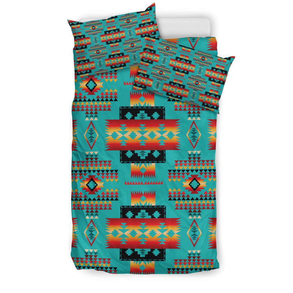 Turquoise bedding set featuring native geometric diamond and stripe blocks