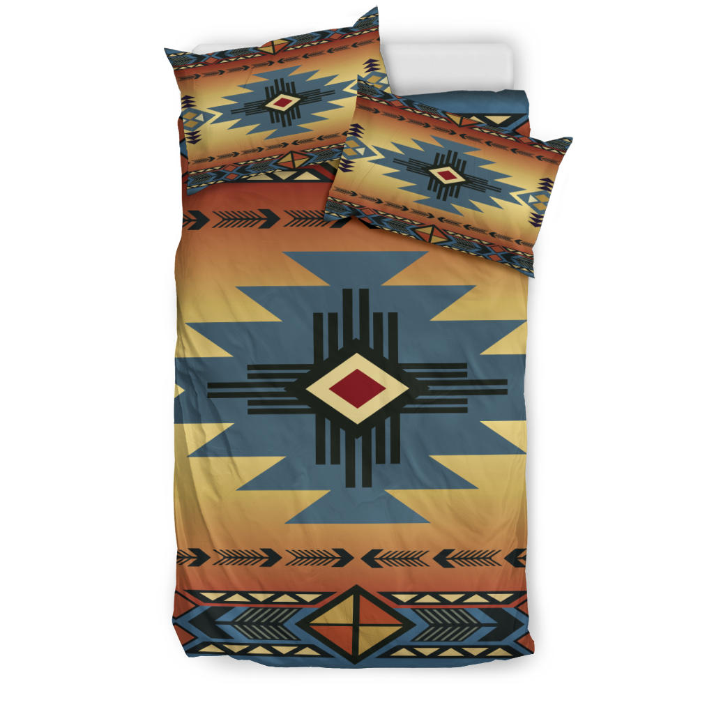Native symbol bedding set with blue star medallion, yellow-orange fabric, geometric border