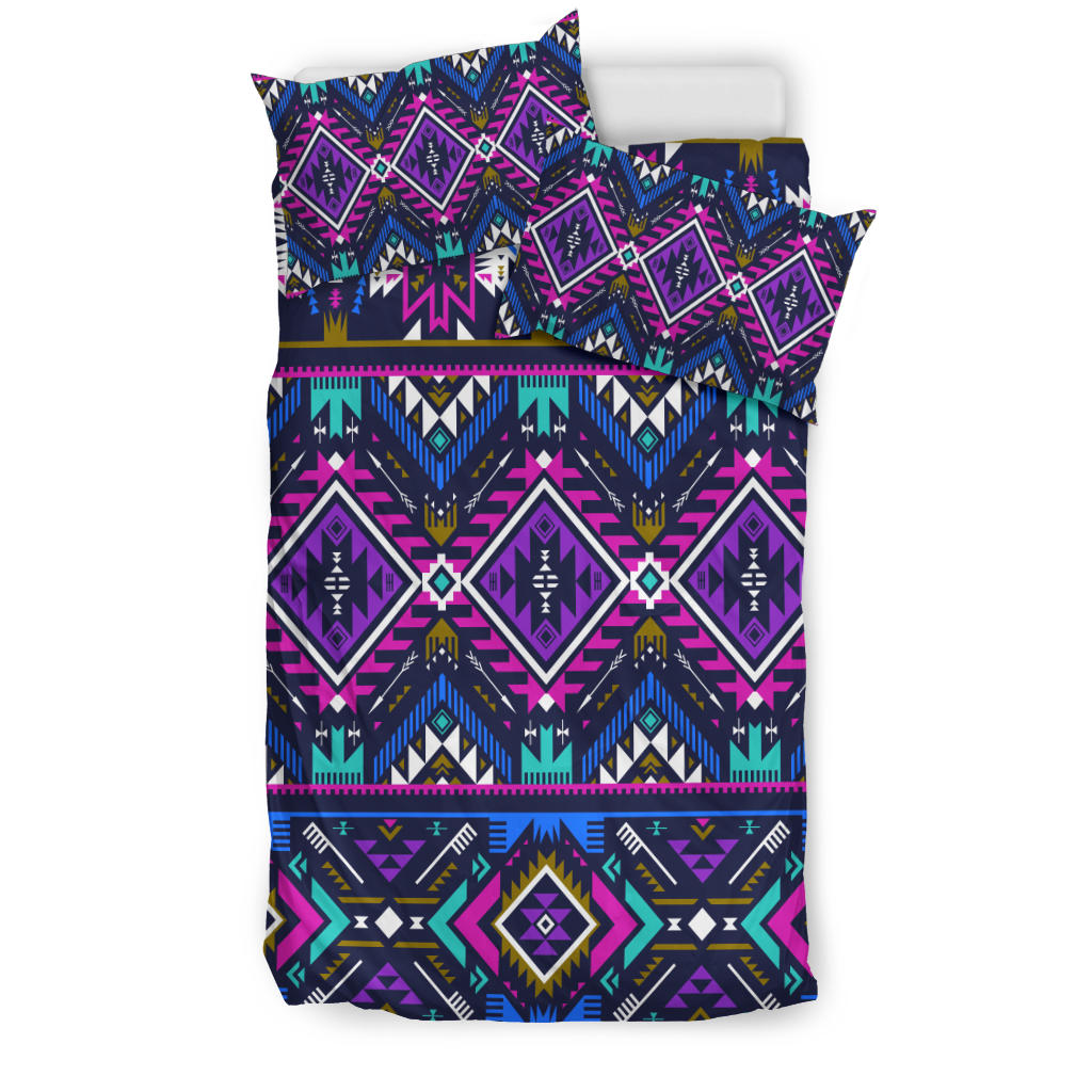 Purple Native-inspired tribal pattern bedding set with geometric diamonds and stripes