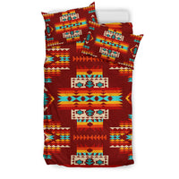 Red bedding set with colorful Native American geometric pattern and matching pillow shams