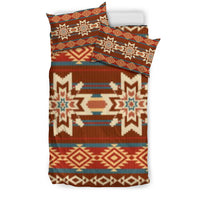 Native American style bedding set with red comforter and geometric multicolor pattern