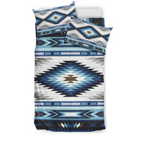 Blue-and-white tribal geometric bedding set with multicolor accents and matching pillowcases.