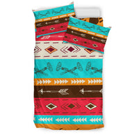 Colorful bedding set with turquoise, red, brown, and arrow-and-diamond Native-style patterns