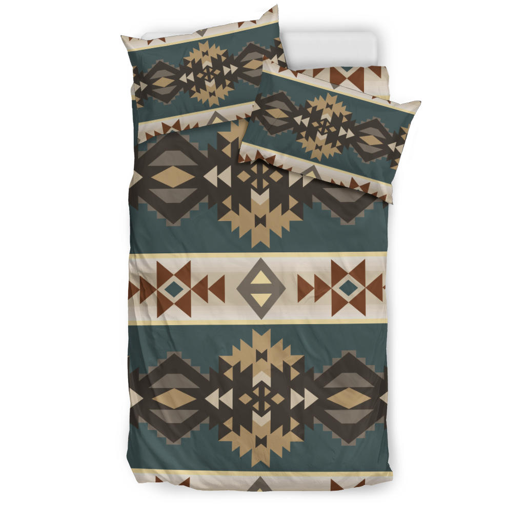 Teal geometric bedding set with Navajo-style diamond and star patterns, multicolor.