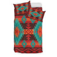Multicolor Native American geometric bedding set with teal, red, and orange duvet and pillows