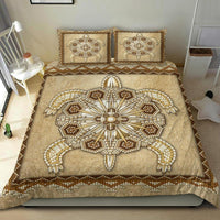 Tan bedding set with beaded turtle mandala and two decorative pillows