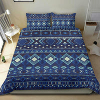 Navy geometric bedding set with matching pillow shams; teal and cream tribal stripes