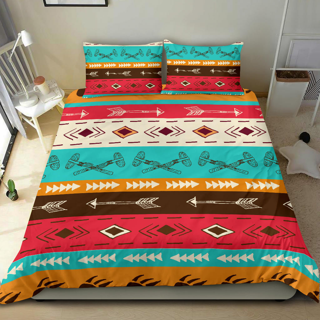 Colorful duvet cover with turquoise, red, and brown tribal pattern plus two sham pillowcases