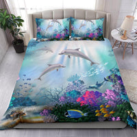 Coordinated dolphin and coral ocean bedding set with 2 matching pillowcases