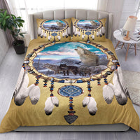 Wolves dreamcatcher bedding set on bed: gold comforter with wolf scene, dreamcatcher ring, 2 pillows
