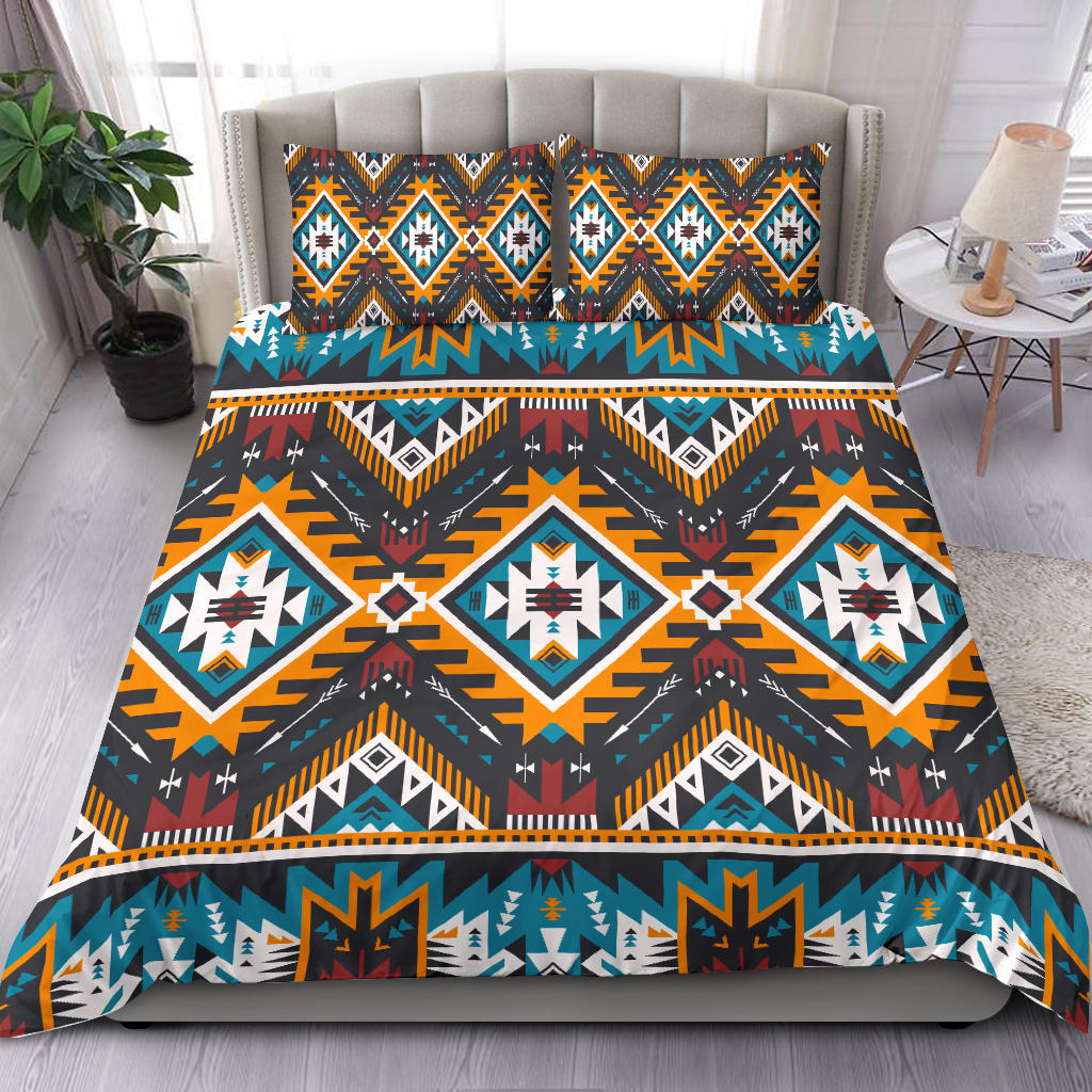 Multicolor geometric bedding set with matching pillows, diamond and arrow patterns