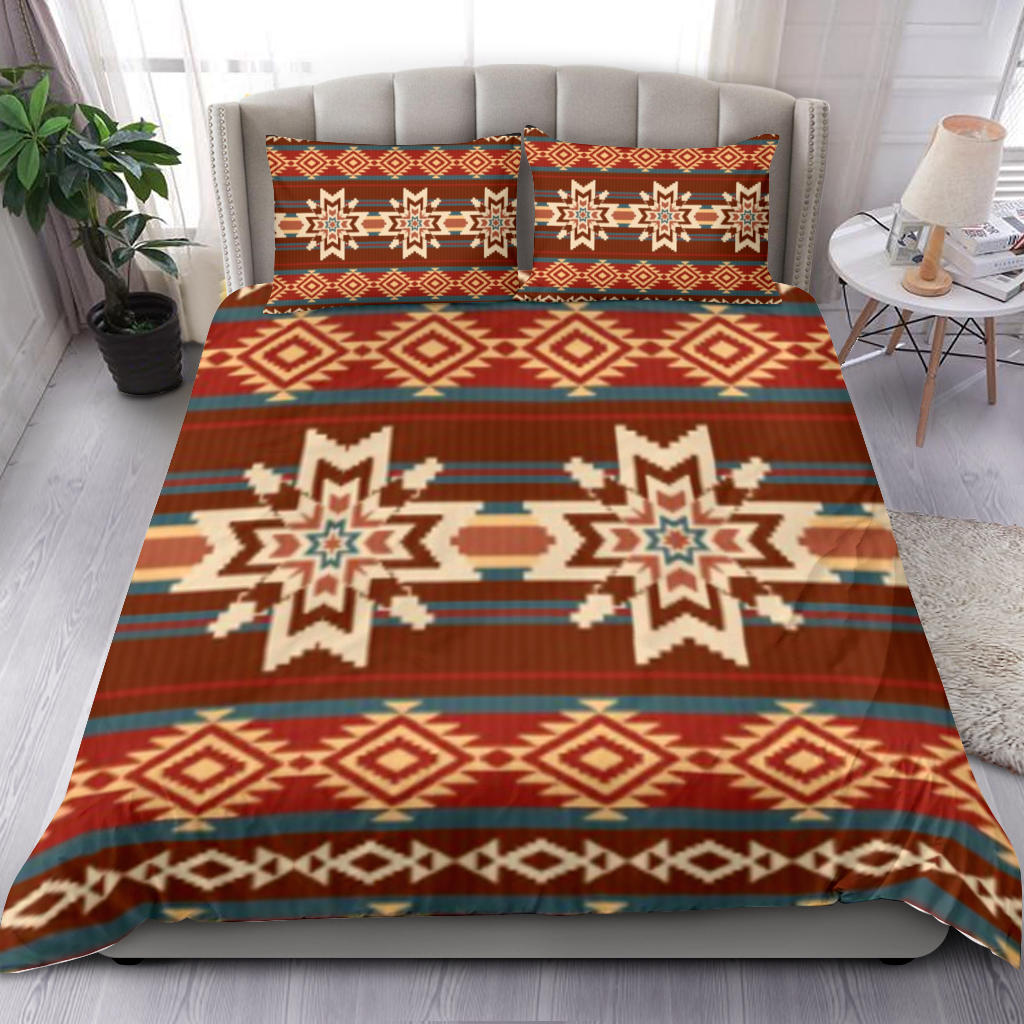 Red geometric bedding set with two pillow covers; diamond and star motifs in blue and cream