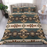 Teal Southwestern geometric bedding set with two pillow shams and coordinating pattern.