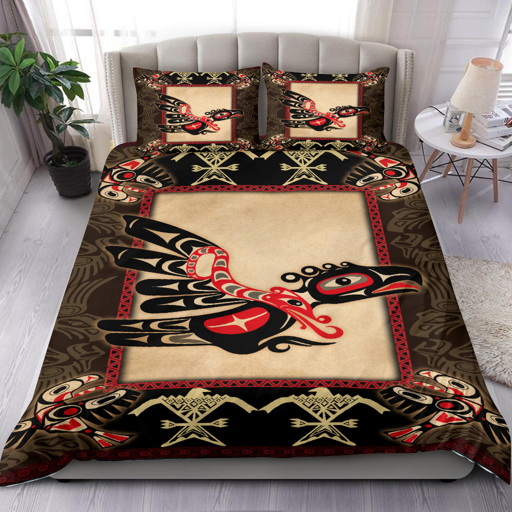 Colorful thunderbird bedding set with cream center panel and red/black star border; two pillows