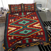 Red tribal pattern bedding set with teal cross shapes and layered chevron details