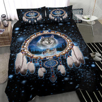 Comforter and two pillowcases with wolf dreamcatcher graphic, feathers and beads