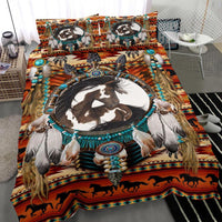 Horse dreamcatcher graphic comforter with teal beadwork, fringed feathers, and horse silhouette border