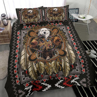 Bear totem bedspread with feathers, red-and-gold circular medallion, two pillows