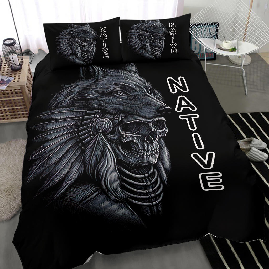 Black duvet and pillows featuring Native skull horse head, eagle skull, and feather motif