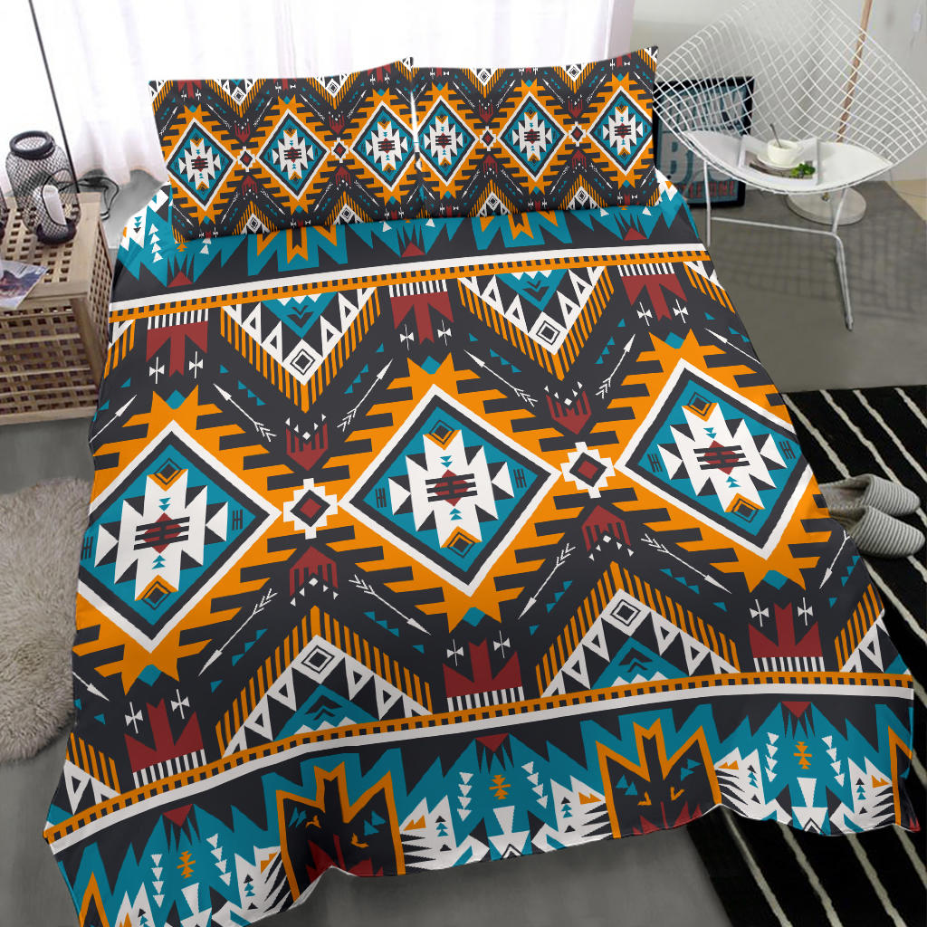 Multicolor Aztec geometric bedding set with layered diamond motifs and patterned border