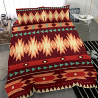 Red tribal bedding set with pillowcases; large zigzag panel and diamond dot accents
