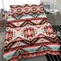 Close view of red tribal Native American bedding set with geometric motifs and teal border