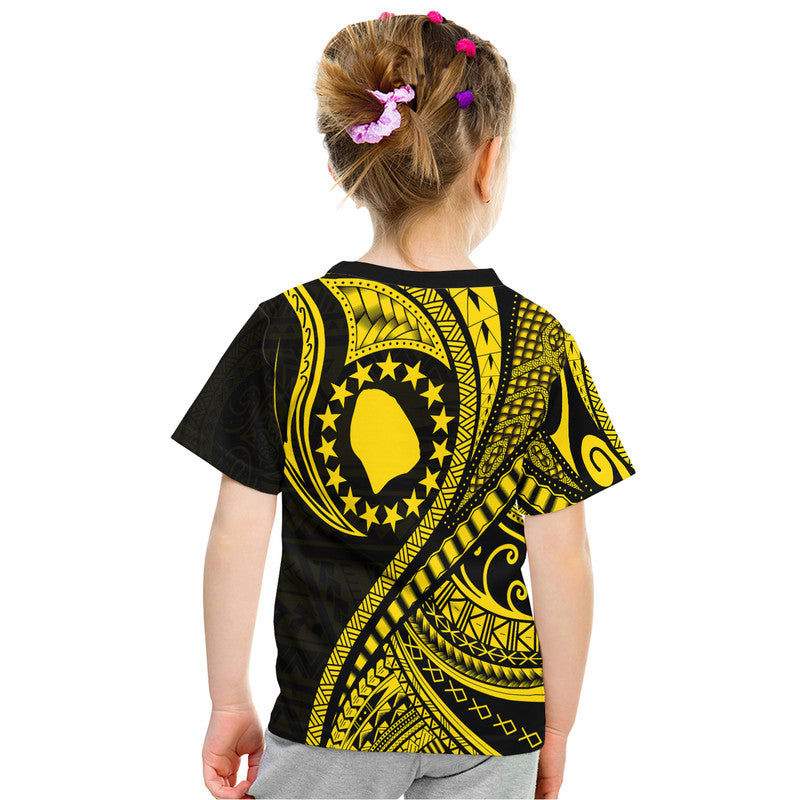 Kids back view black and gold Polynesian wave T-shirt with circular emblem, short sleeves