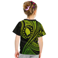 Back of green and black Polynesian wave T-shirt with circular star emblem.