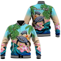 Blue baseball jacket angled view with turtle-and-orchid tropical print