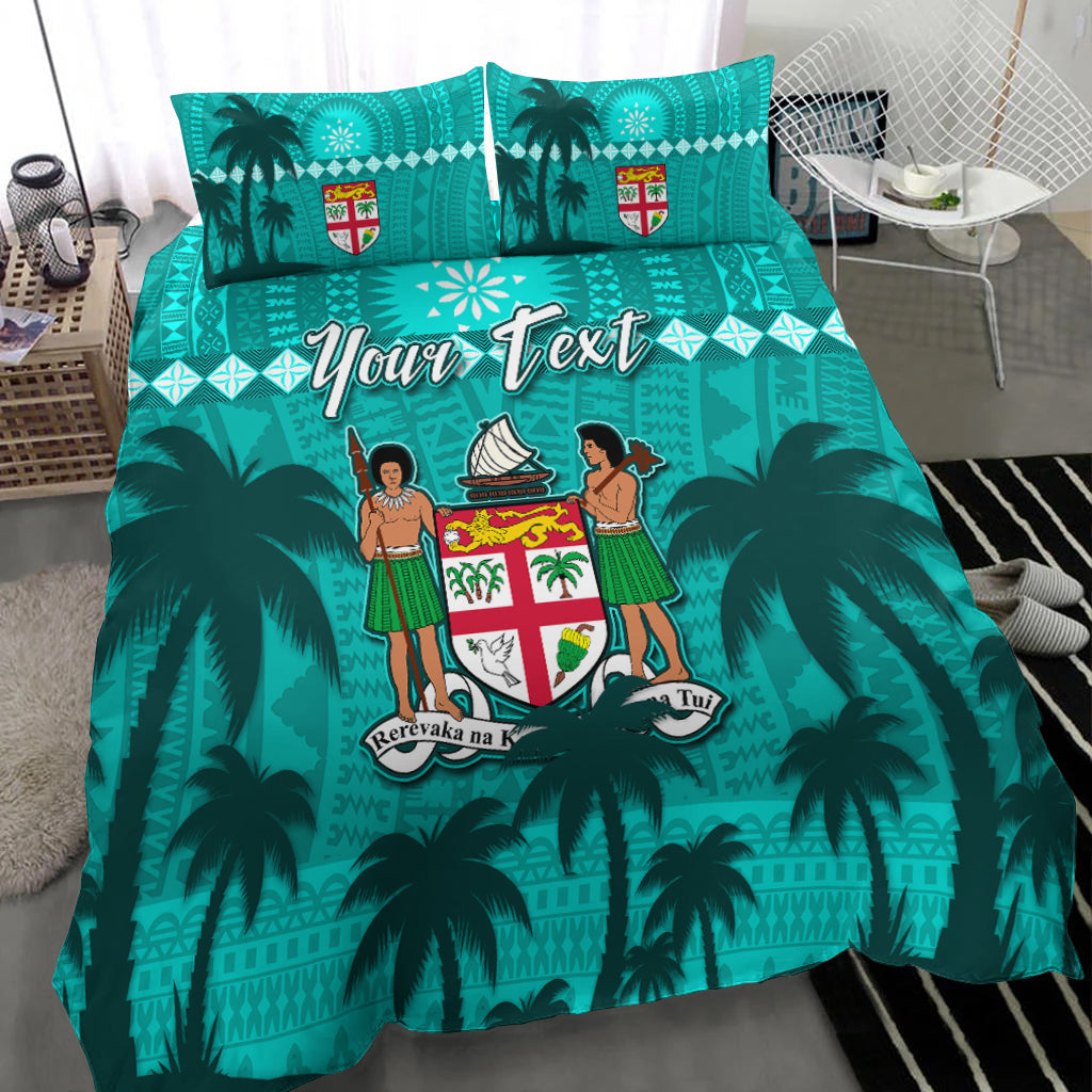 Turquoise tropical bedding set with palm leaves, crest shield design, and two matching pillows