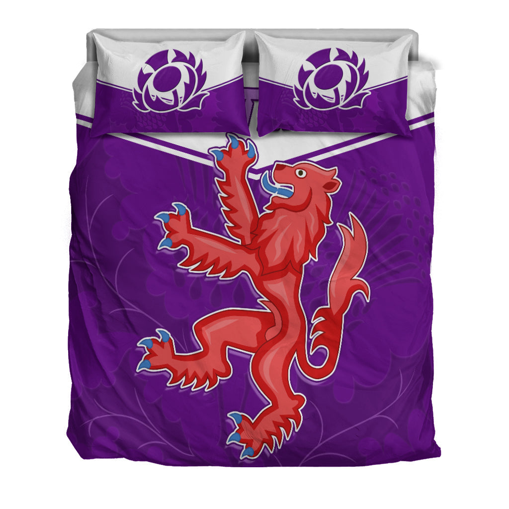 Purple bedding set with large red Scottish lion design and white thistle motifs on pillows