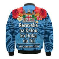 Blue bomber jacket back view, Rerevaka na Kalou text and 10 October 1970 date