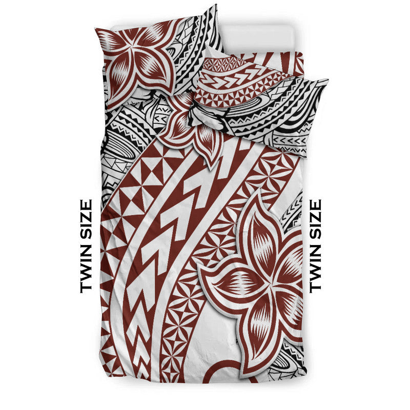 Twin-size bedding with red, white and black Polynesian tribal floral and geometric print