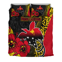 Black duvet cover set with two pillows; red hibiscus and bird over stars-and-moon; red striped panel