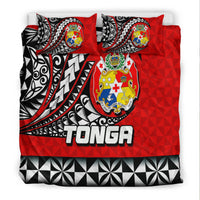Red Tonga bedding set with two pillowcases, Polynesian crest, bold TO NGA lettering, geometric trim