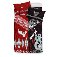 Folded bedding set: red geometric design with white Tonga emblem and black Aotearoa panel