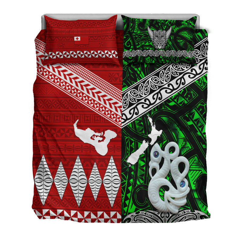 Red-and-green bedding set with ornate black-and-green panel, white sea-creature motif