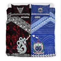 Two-tone bedding set: black-red Aotearoa pattern and blue Samoa pattern with emblem