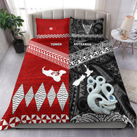 Black bedding set with red Tonga panel and white tribal patterns; includes Aotearoa pillowcases