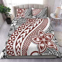 White bedding set with bold red, black tribal floral and geometric tattoo-style pattern