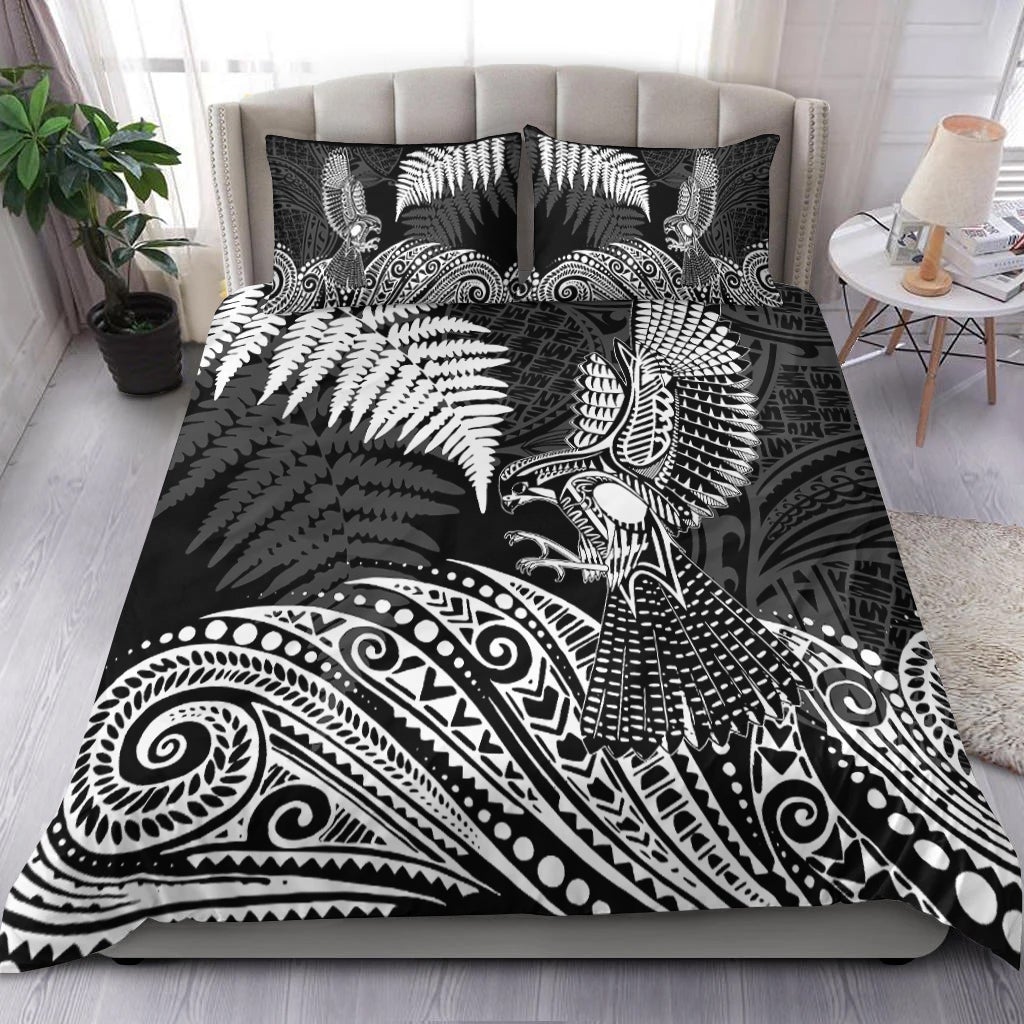Black & white bedding set with fern-and-bird artwork and two matching pillows