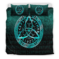 Black and teal bedding set with large cyan Vegvisir symbol centered on duvet