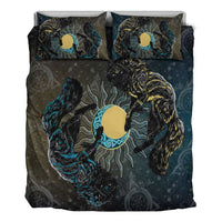 Bedding set with two cat portraits facing inward around yellow moon, with two pillows