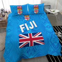 Blue Fiji bedding set with 'FIJI' print, Union Jack flag center, shield emblem pillows