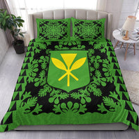 Green & black leaf-pattern bedding set with centered shield emblem and two pillows