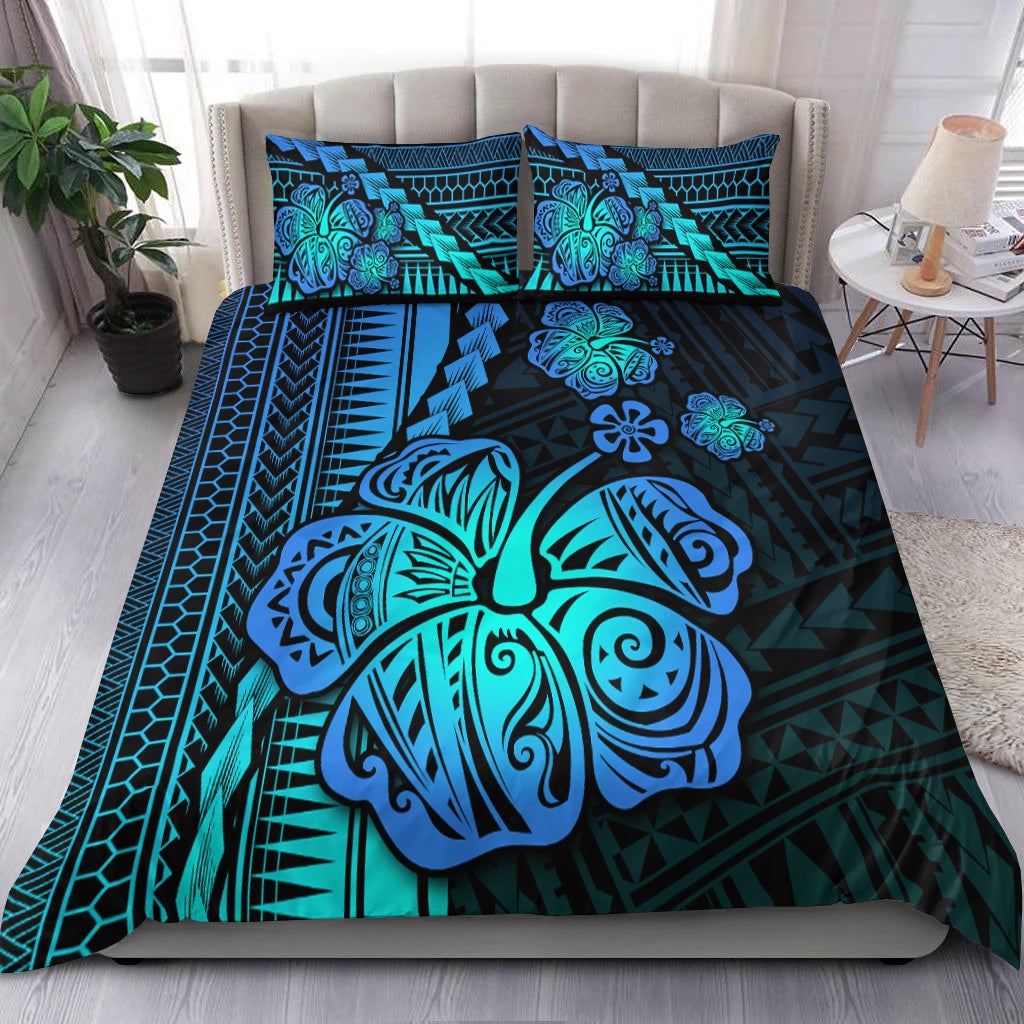 Black bedding set with teal sea turtle & hibiscus, bold geometric patterns on duvet and pillows