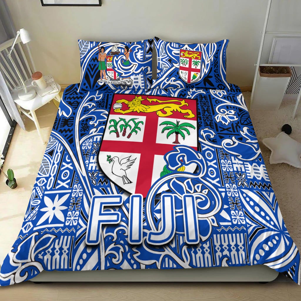 Blue/white tapa bedding set with Fiji flag cross center and bold “Fiji” logo print