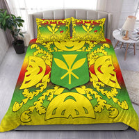 Hawaiian bedding set with two yellow pillows and green-yellow-red gradient shield motif