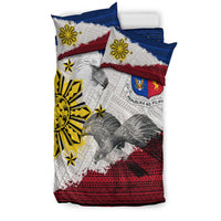 Side view of white, blue and red Filipino tribal eagle bedding set with shield crest and sun